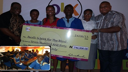 (L-r): Dan Foster, radio personality, Light Onodu, pupil of Pacelli School for the Blind Surulere, Lola Masha, country manager, OLX, Abednego Jacob, another pupil, Pacelli School for the Blind, Rev. Sister Agnes Onwudiwe, matron/teacher, Pacelli School for the Blind and Partially Sighted and Olisa Adibua, another radio personality, during the presentation of a cheque to the school in Lagos on Wednesday. ,,,Insert (Pupils of Pacelli School for the Blind and Partially Sighted choir presenting a song).